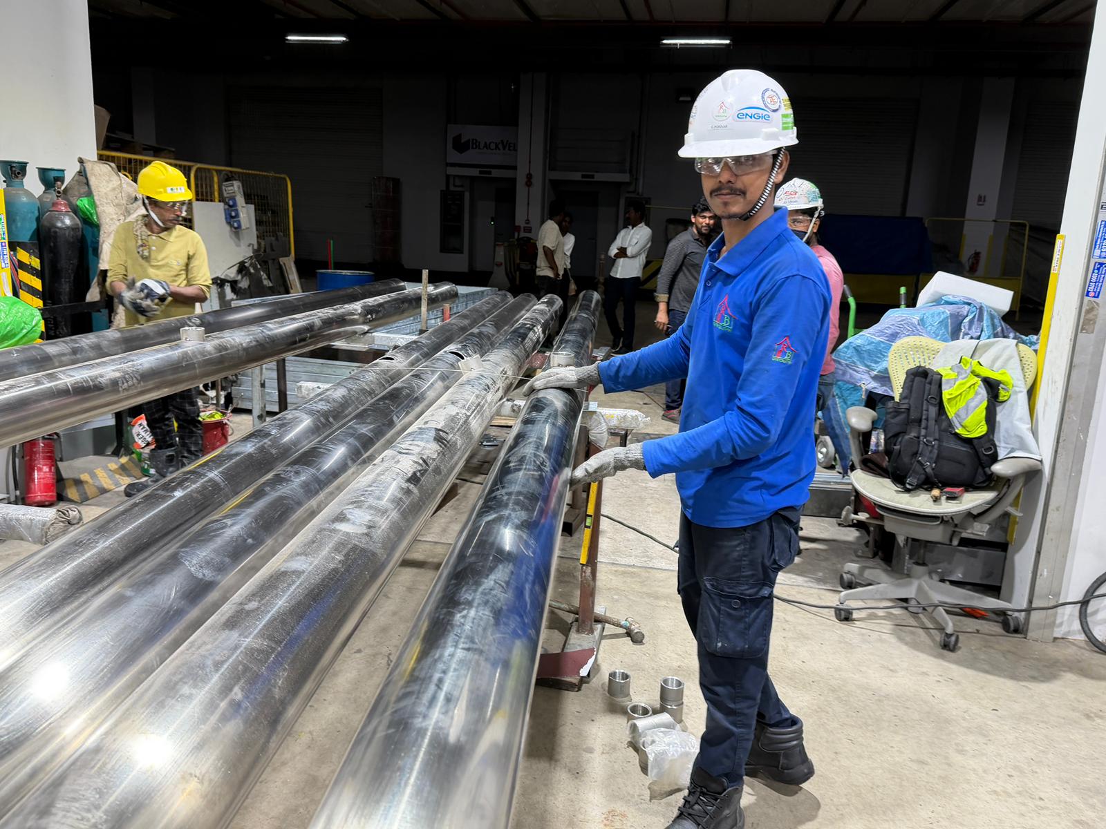 Steel pipe assembly in workshop
